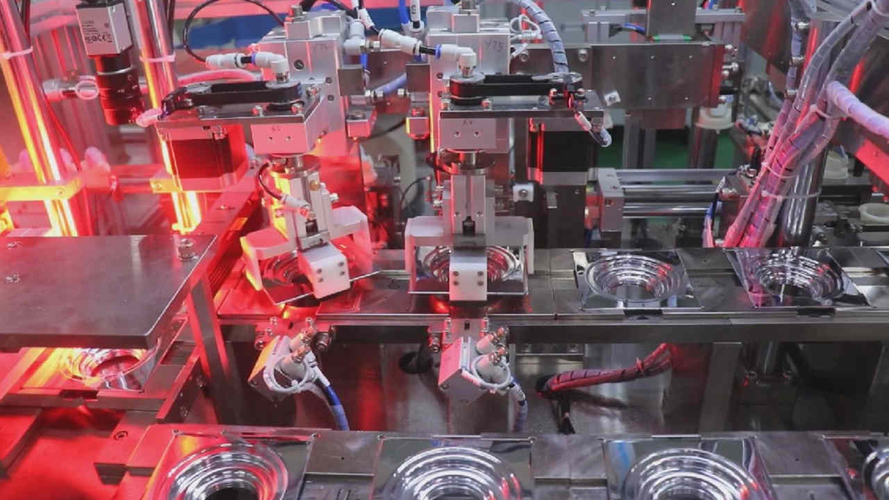 Floor drain assembly machine